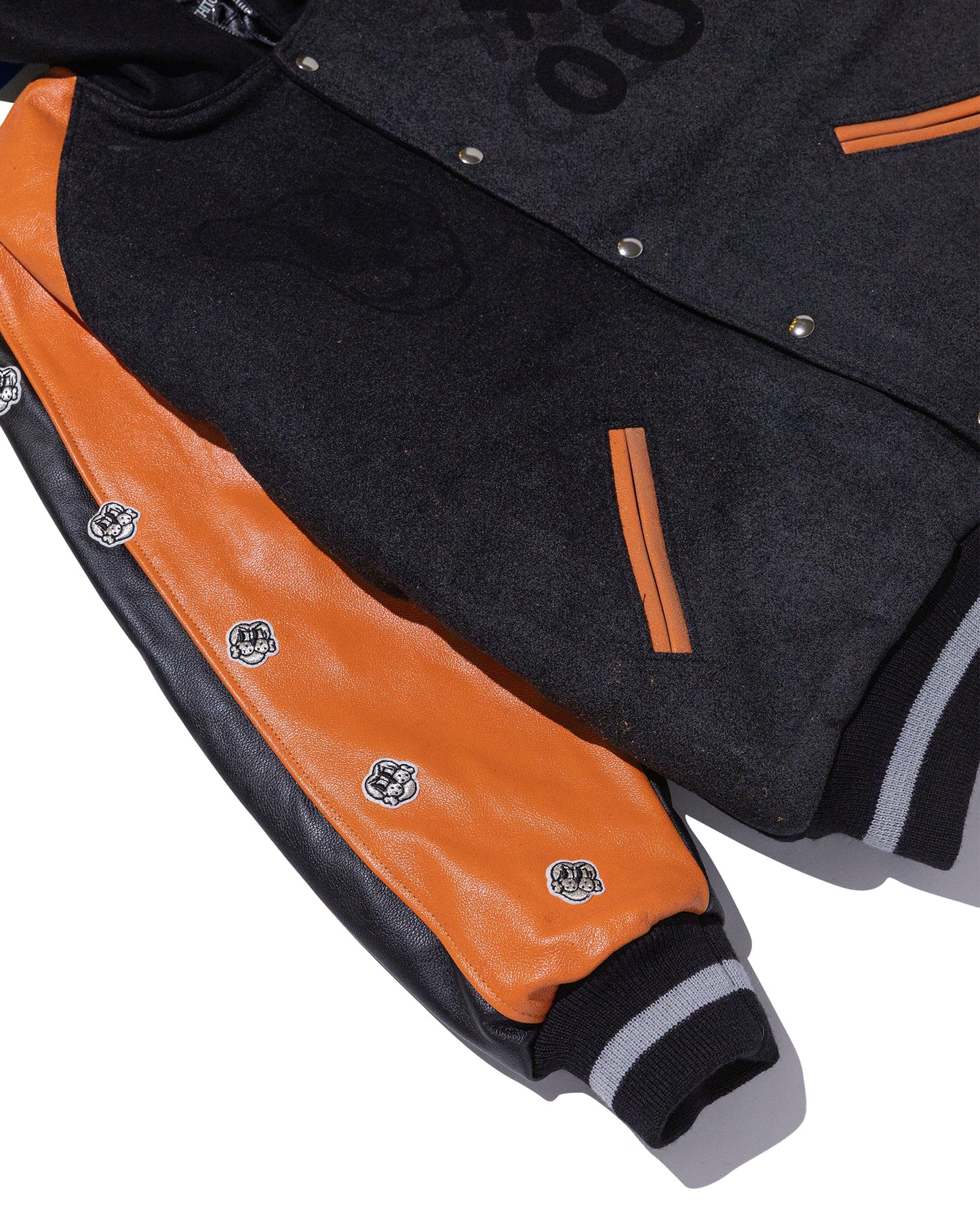 COIN VARSITY JACKET w/ ORANGE LEATHER